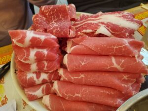 Taiyou Japanese Shabu & Sushi - pork (bottom left), rib eye (top left), prime beef (top right), sirloin beef (bottom right)